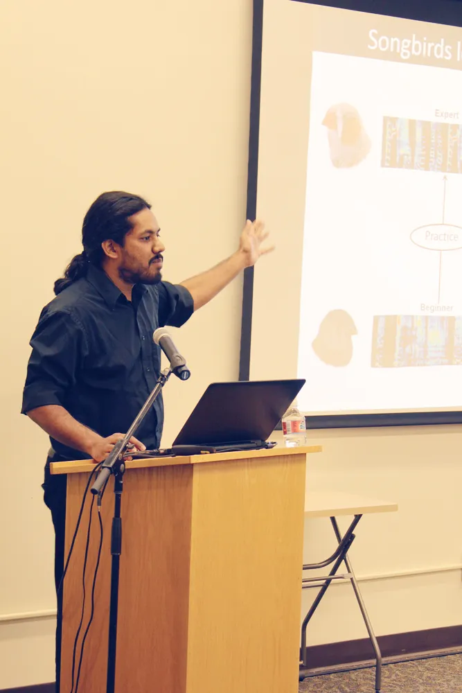 Photograph of Vikram Gadagkar giving a SPARK talk